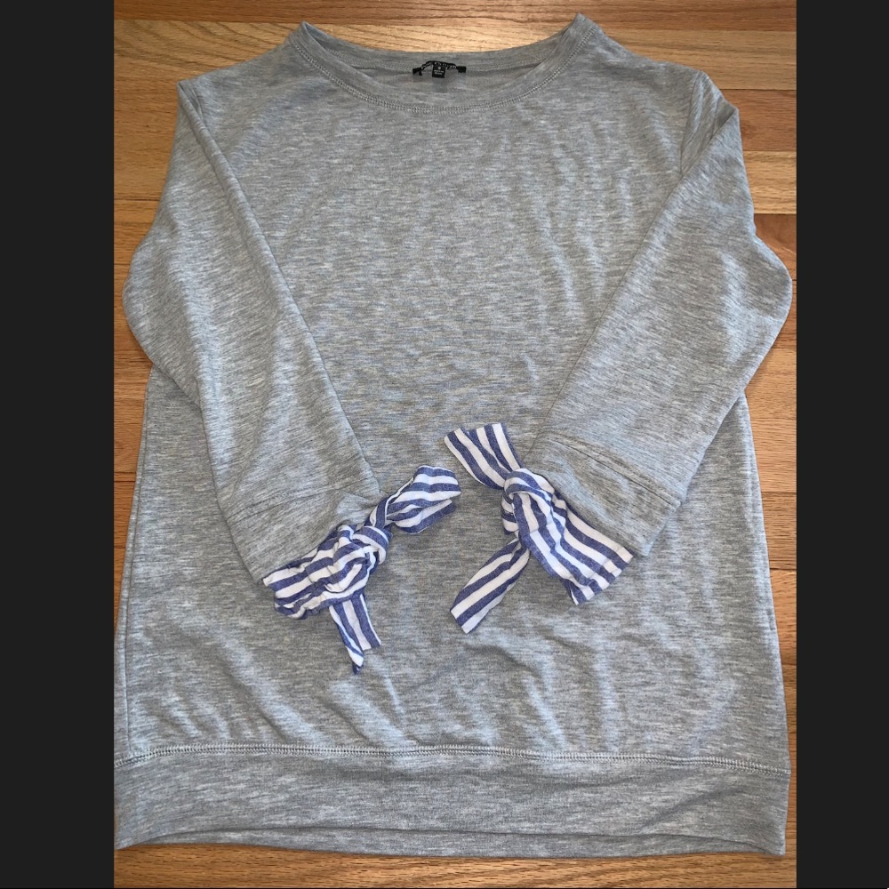 Gray sweater with tie sleeve detail